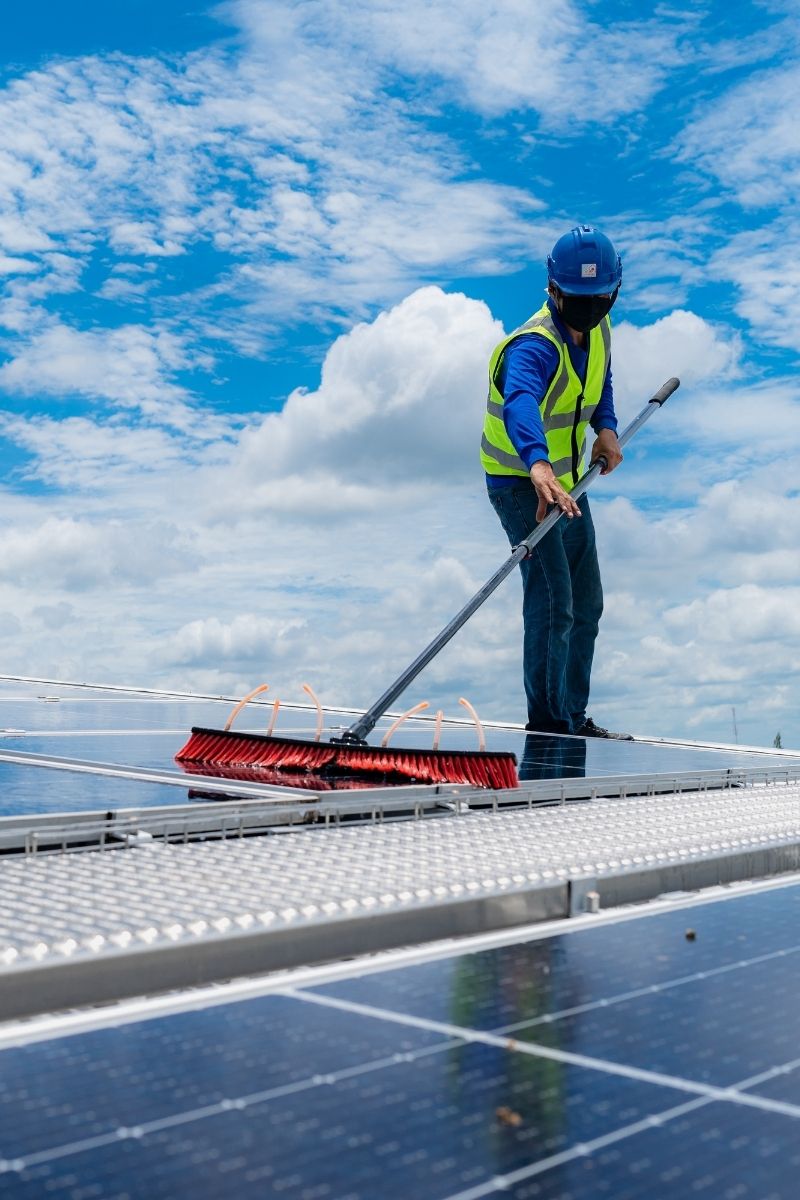solar panel being cleaned
