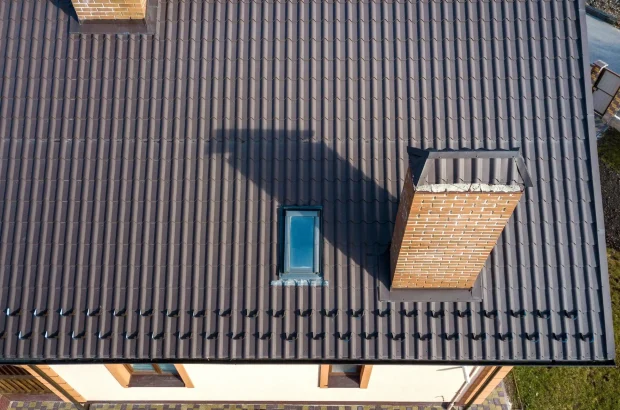 Roof cleaning service removing stains and buildup in Roslyn NY